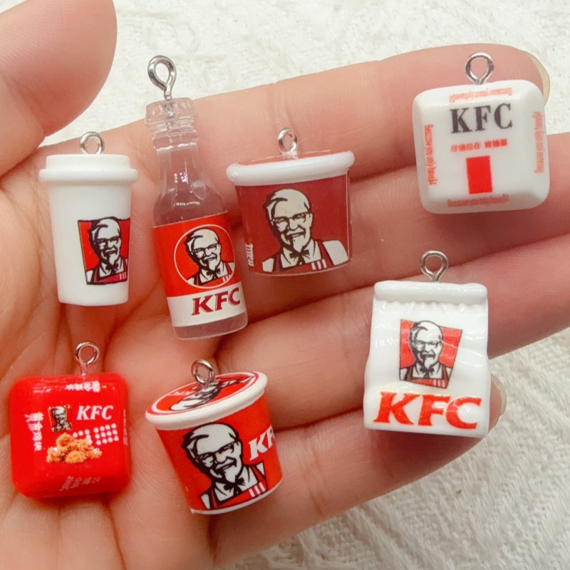 Novelty Gifts - 10 szt. breloczków z żywicy w